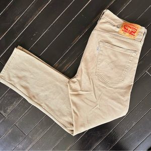Levi’s 502 Men’s pants 34 x 30 tan sand khaki color